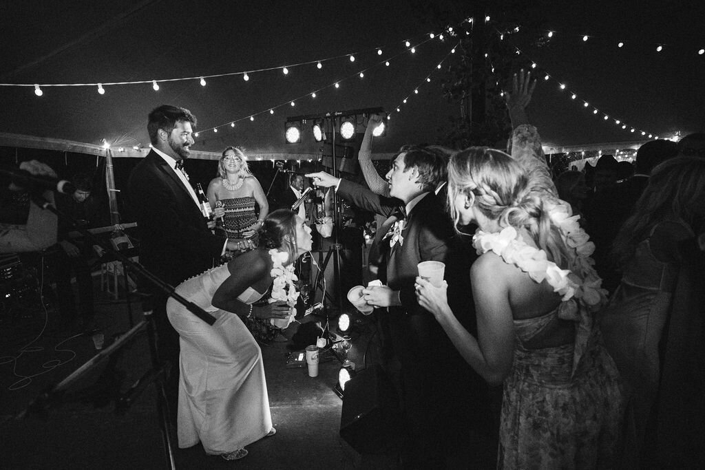Packed wedding dance floor with live band entertainment